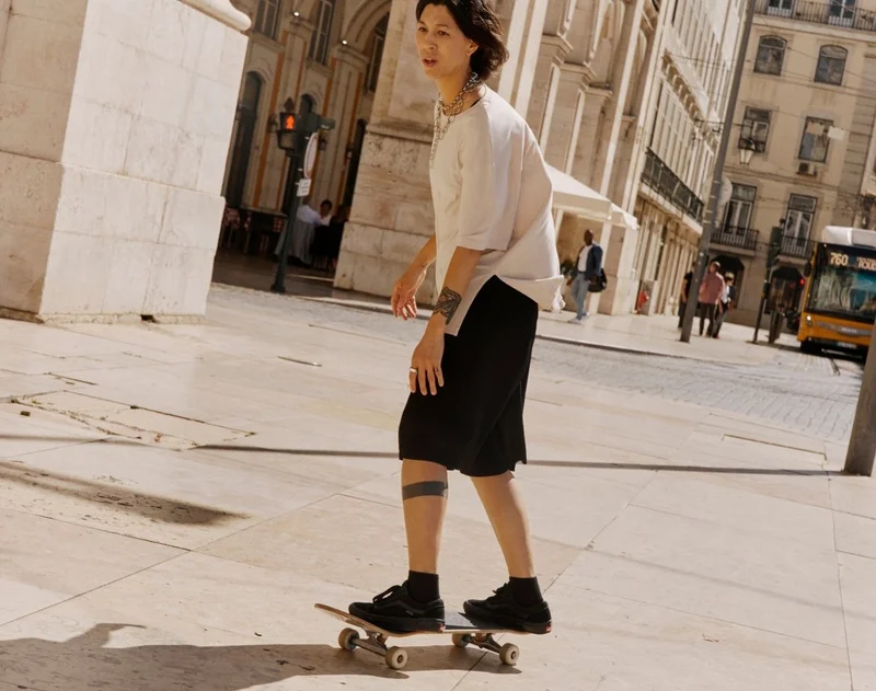 Person on a skateboard wearing Oura Ring
