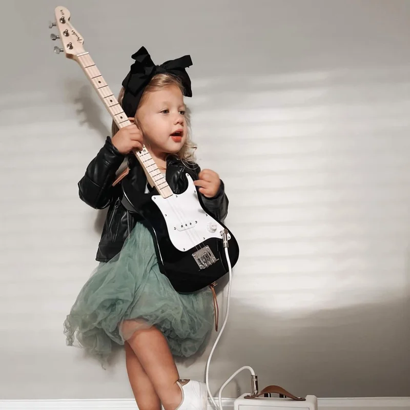 Kid playing guitar