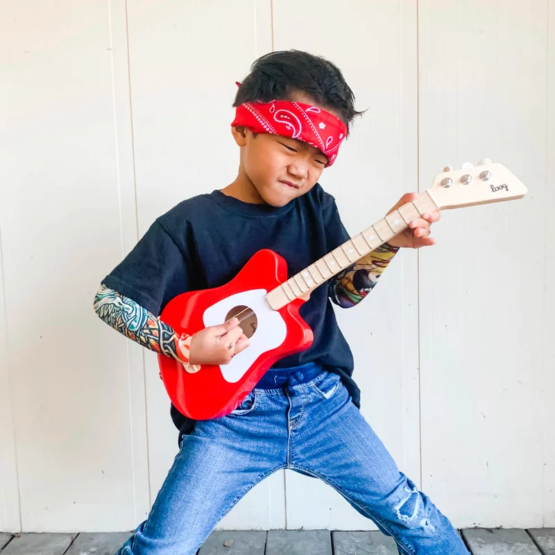 Kid playing guitar