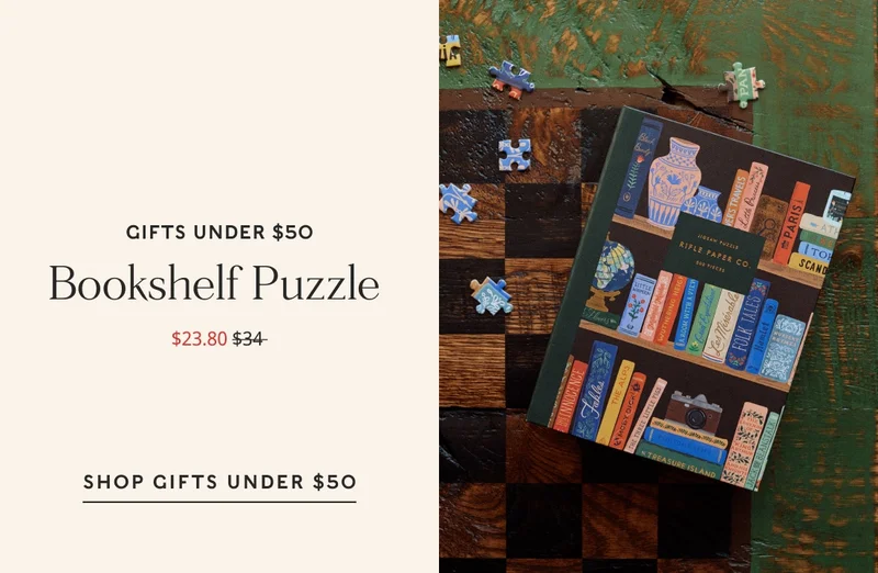 Gifts under $50 Bookshelf puzzle $23.80 The illustrated puzzle includes 500 pieces, packaged in a decorative box with gold foil accents designed to look like a book on your shelf. shop GIFTS UNDER $50