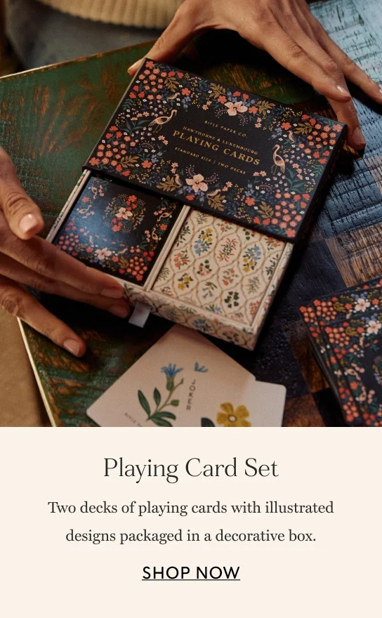 Playing Card Set. Two decks of playing cards with illustrated designs packaged in a decorative box. SHOP NOW