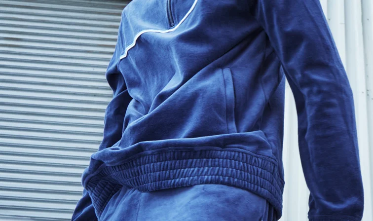 Man in velour track suit