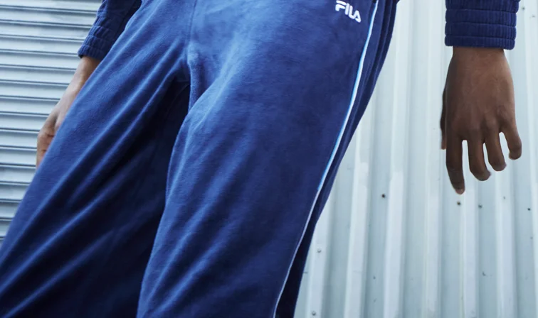 Man in velour track suit