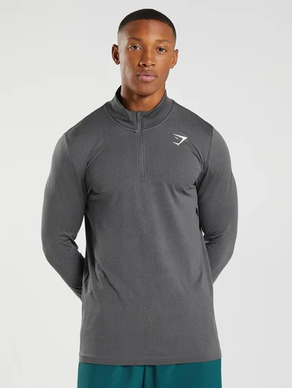 SPORT SEAMLESS 1/4 ZIP. Silhouette Grey.