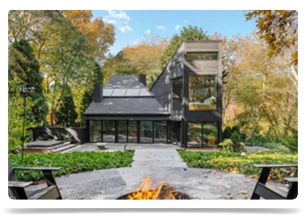 Enjoy a contemporary home with fire pit in Southampton, New York.