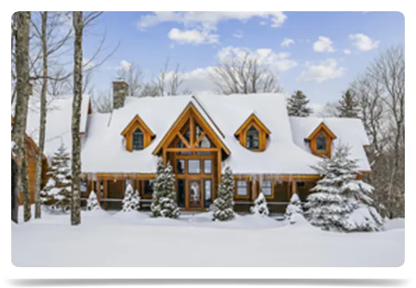 Plan a cozy getaway amid snow-filled trees in Woodstock, Vermont.
