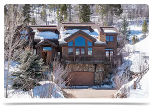Find your snowy Vail retreat in a stone-built home with scenic views.