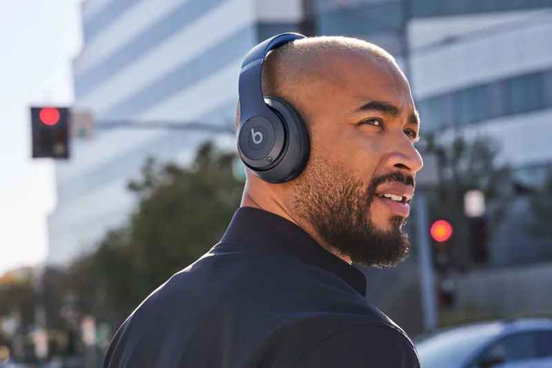 Person wearing Beats Studio Pro in Navy.