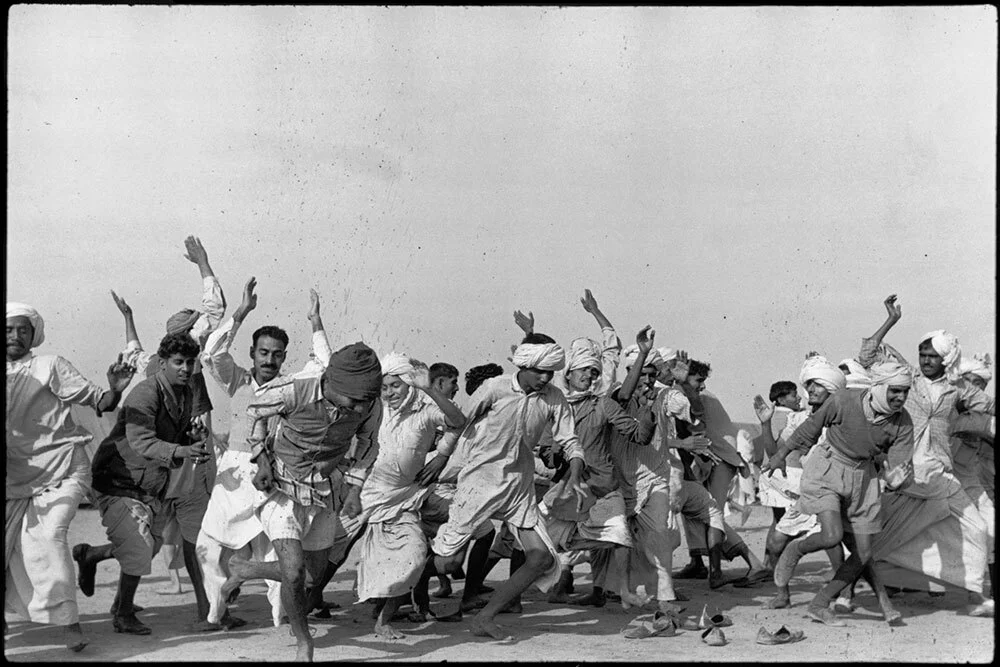 People exercise in an Indian refugee camp in Kurukshetra