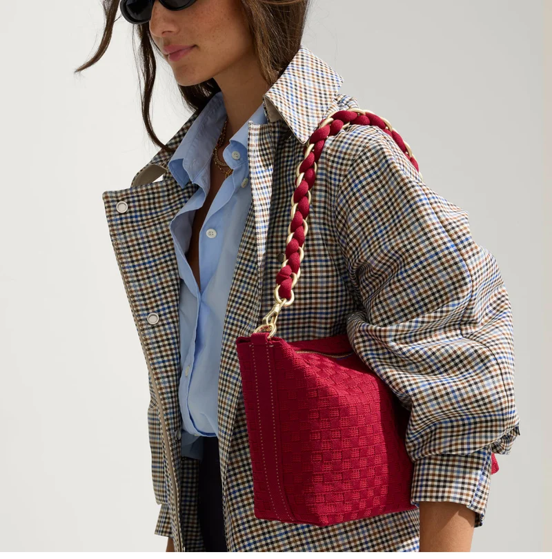 Add a strap. Our sellout chain shoulder straps are back in fresh colors.