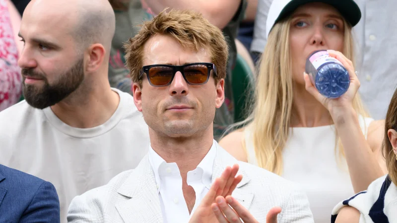 LONDON, ENGLAND - JULY 02: Louis Partridge and Olivia Rodrigo attend day three of the Wimbledon Tennis Championships at the All England Lawn Tennis and Croquet Club on July 02, 2025 in London, England. (Photo by Karwai Tang/WireImage)