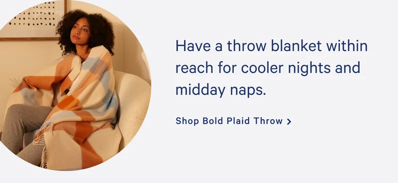 Have a throw blanket within reach for cooler nights and midday naps. >> Shop Bold Plaid Throw >>