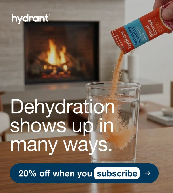 an image of a person pouring a drink into a glass