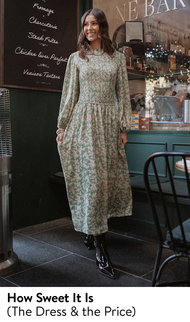 A woman wearing a floral print long-sleeve maxi dress.