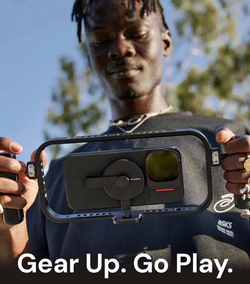 Get 10% Off This Weekend - Image of someone holding an iphone and taking a picture with the new moment creator cage, case and  QuickLock filters