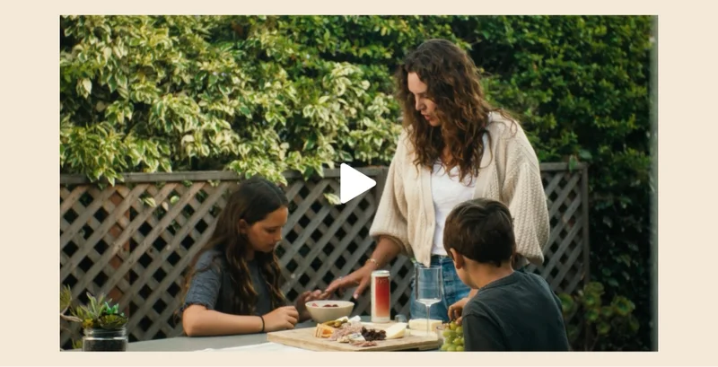 a productive parent shares lunch with her two kids while enjoying a delicious strawberry guava hiyo