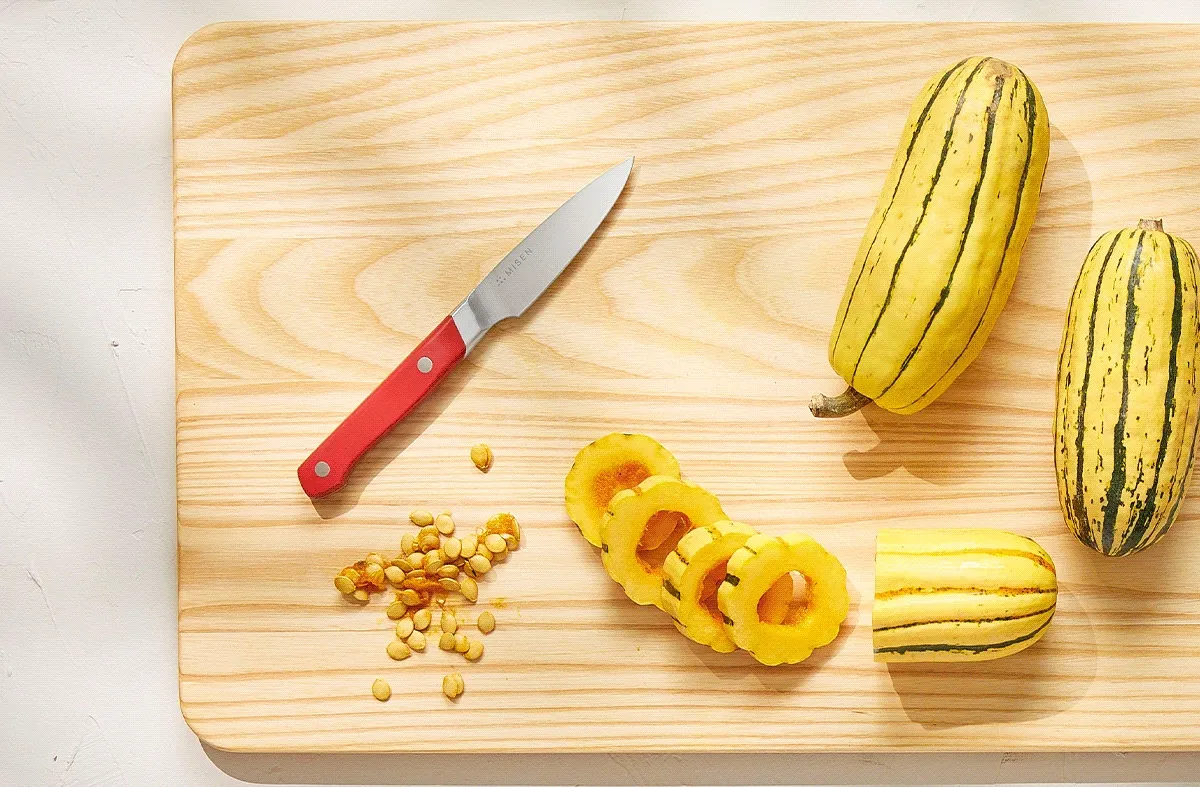 Misen knife cutting a red onion