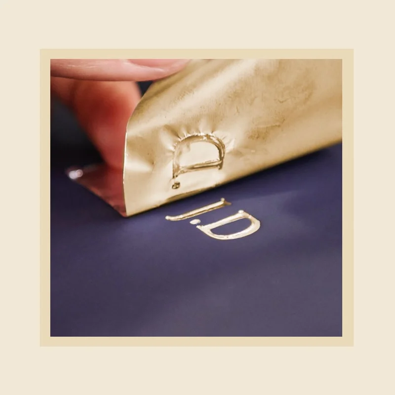 Initials are debossed into a Dyson presentation case