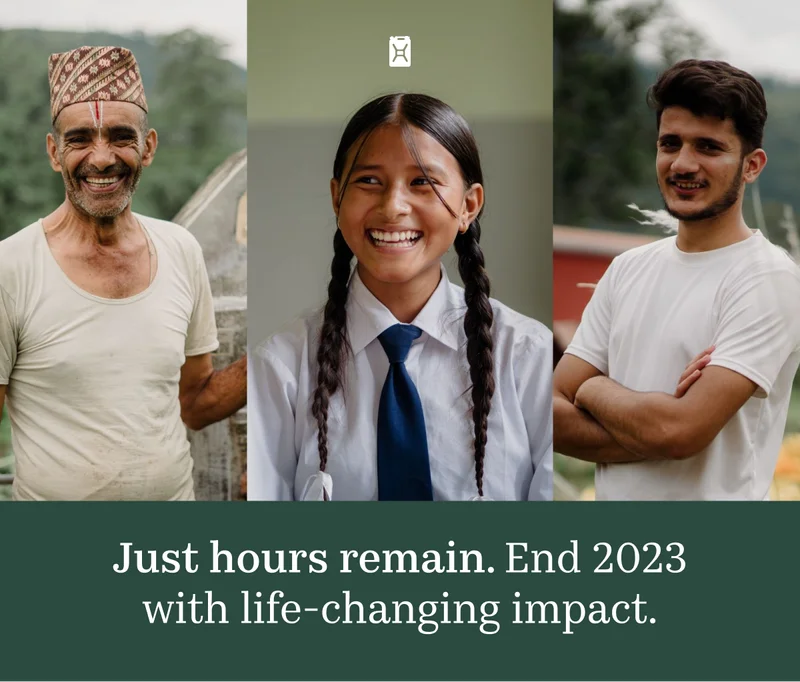 Two Nepalese men and a young Nepalese girl smiling