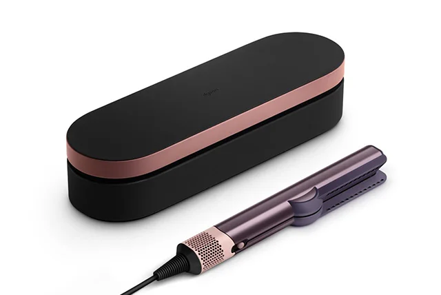 The Dyson Airstrait straightener with a Dyson Presentation case