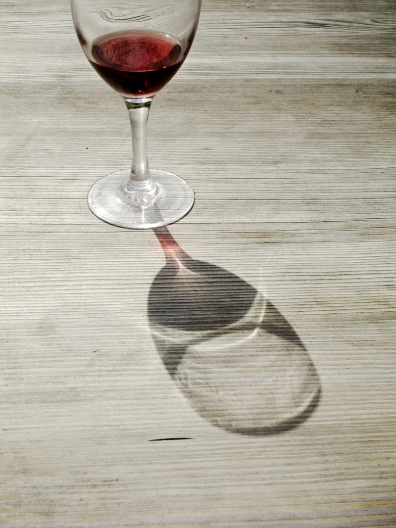 A glass of red wine a day has long been thought to have some health benefits, but new research is casting doubt on that theory—and experts say any benefits are outweighed by the risks.