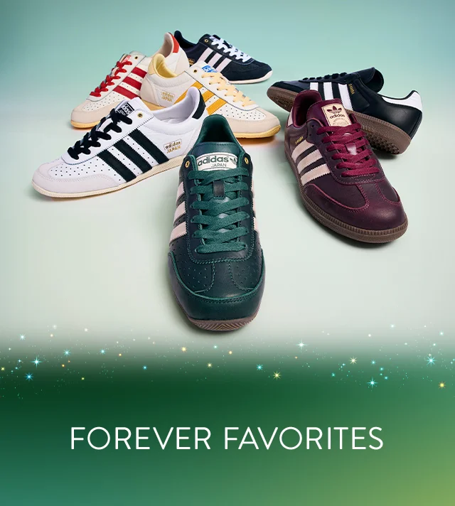 An assortment of adidas sneakers.