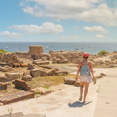 The Phoenician city of Tharros is home to ancient ruins, which include monuments, temples, tombs, and necropolises—evidence of the ancient Nuragic civilization that inhabited Sardinia during the Bronze Age. It’s just one of several not-to-be-missed experiences in Sardinia, Italy.