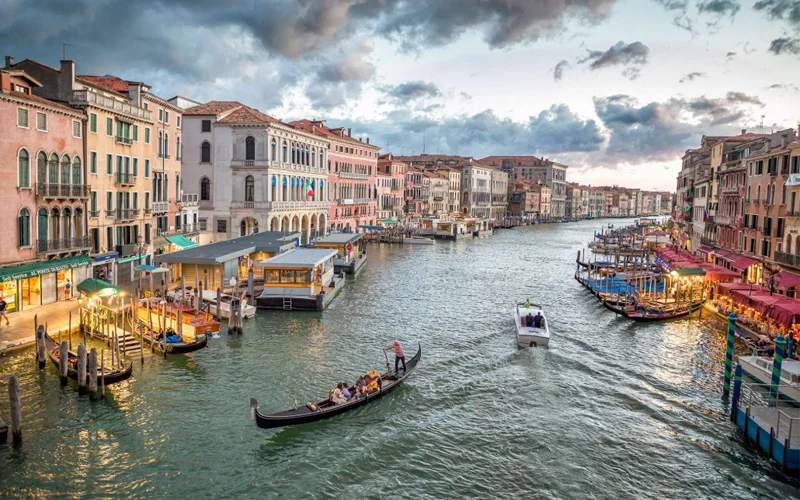 Built on a group of 125 islands in the Adriatic Sea, Venice, the capital of Italy’s Veneto region, has 150 canals, including its main boat thoroughfare the Grand Canal.