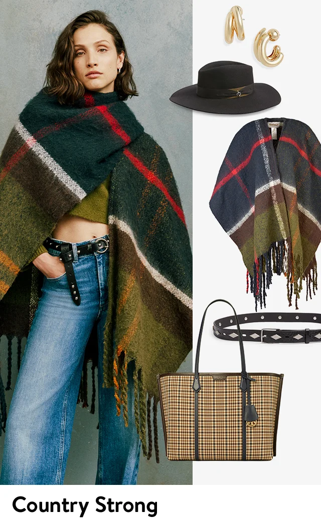A woman wearing a printed serape with jeans and an embellished belt. Hoop earrings, a wool fedora and a plaid tote bag to complete the look.