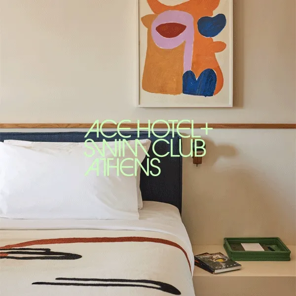 Ace Hotel + Swim Club Athens room with a cozy bed and colorful abstract art. Animated yellow lines and the hotel name appear in a sleek, stylized font, adding a dynamic touch.