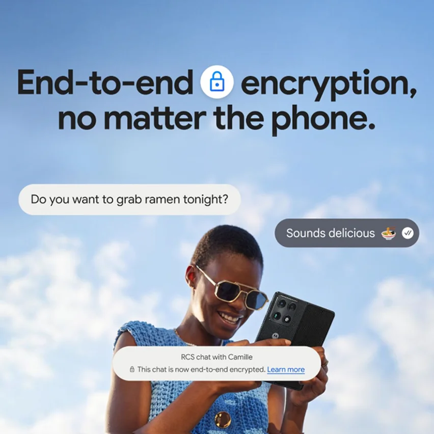 Person smiling at a foldable smartphone with floating chat bubbles and 'End-to-end encryption' text against a blue sky.