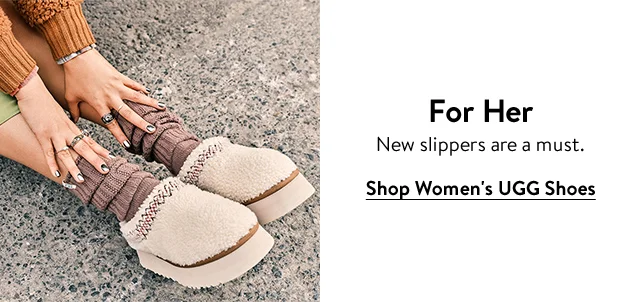 Woman wearing UGG slippers.