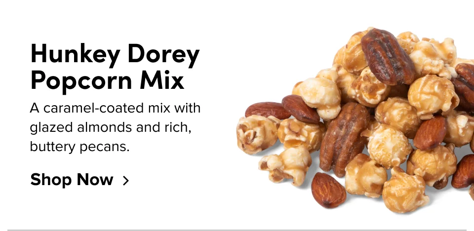 Hunkey Dorey Popcorn Mix A caramel-coated mix with glazed almonds and rich,  buttery pecans. Shop Now