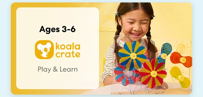 Young child smiling while working on creative KiwiCo Sprout projects, perfect for ages 3–6 for play and learn.