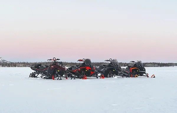 Lined up Lynx snowmobiles
