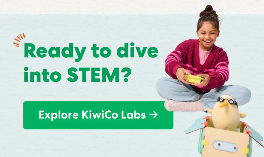 A child sitting on the floor, playing with a STEM project. A child sitting on the floor, playing with a STEM project.