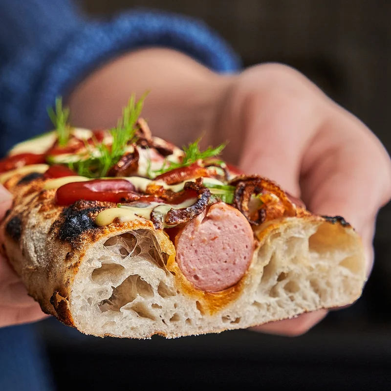 Pizza Hot Dogs with Quick-Pickled Cucumbers and Crispy Fried Onions