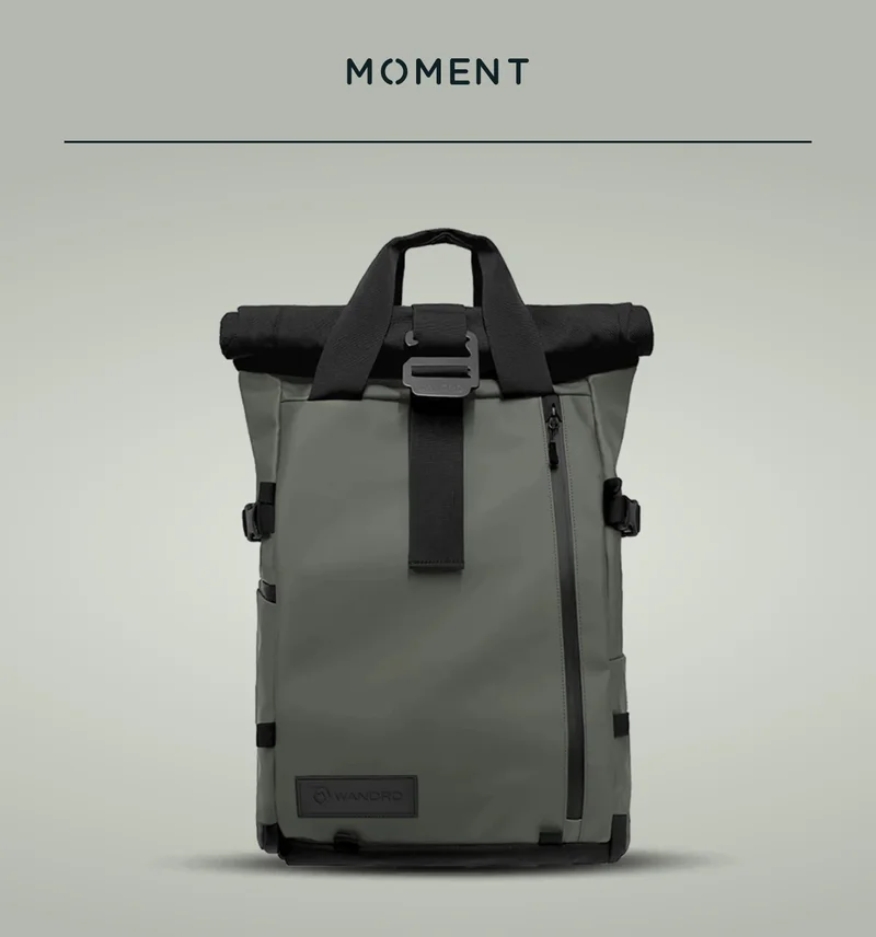 Wandrd Brand backpack on a green table