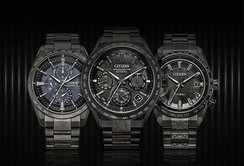 Close up of 3 HAKUTO-R timepieces on a black background