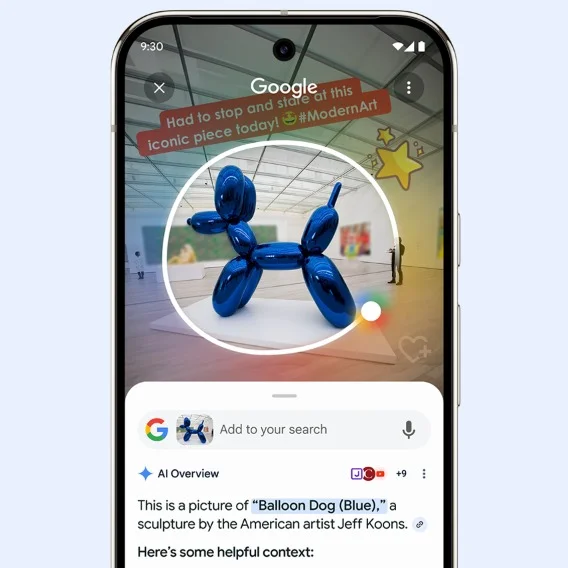 A phone with a circled picture of Jeff Koons’ “Ballon Dog (Blue)” sculpture, with an AI Overview description that reads “This is a picture of “Balloon Dog (Blue),” a sculpture by the American artist Jeff Koons.