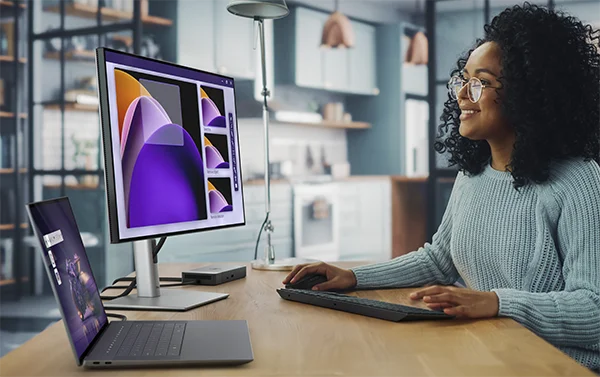 Lady Working on Dell 16 Premium Touch Notebook