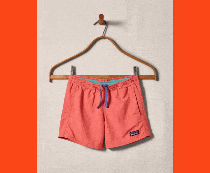 Used to be cool. Still is. A rotating gif of three photos. First photo: a pair of Baggies Shorts on a hanger. Second photo: a smiling, mud-covered young person wearing a shirt, shorts and rain boots. Third photo: an archival photo a Patagonia catalog showing a shirt, four pairs of shorts and a short ode to migrating salmon.