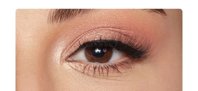 Close-up of an eye wearing Magnetic Lashes with a natural, full strip look.