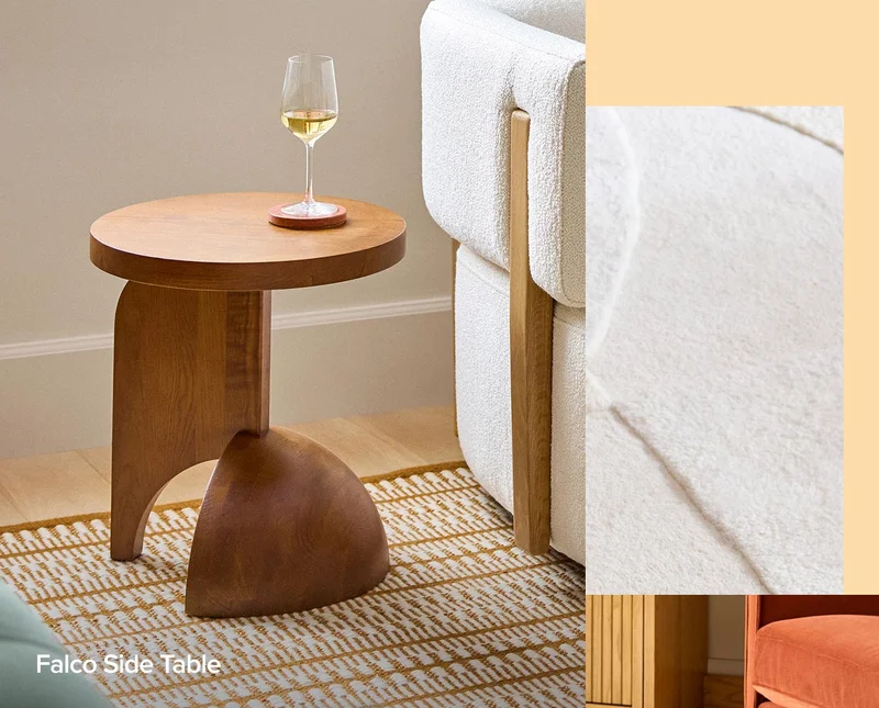 It doesn’t take much: an asymmetrical smoked oak side table, a rug with fringe, or an oh-so-touchable bouclé pouf.