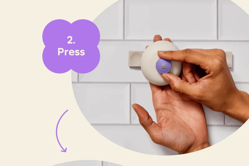 2. Press the button into the back of the bar