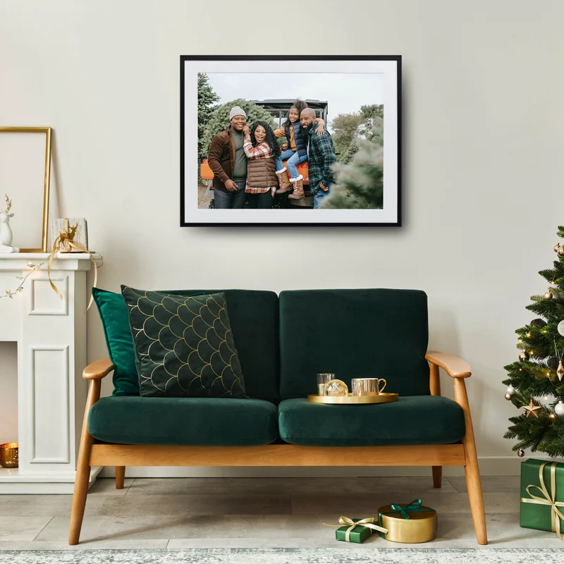 Framed print of family at Christmas tree farm.