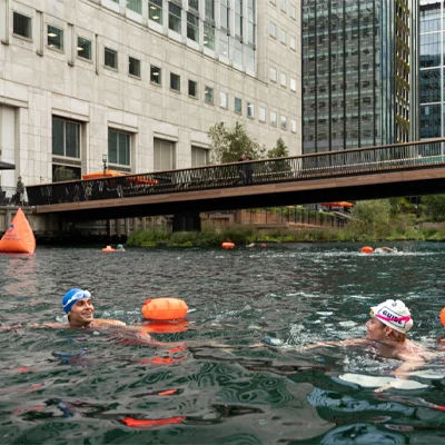 Antoni Porowski takes a cold, refreshing swim with his guide Francesca at Canary Wharf in the heart of London's financial district.