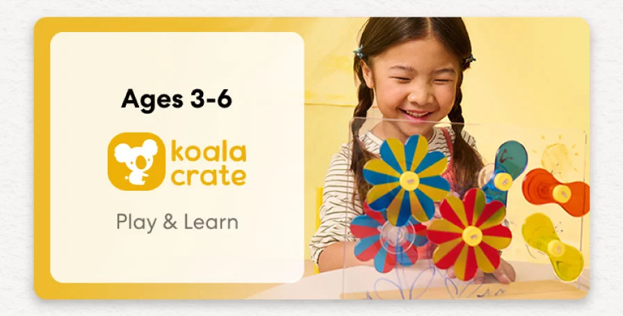 Young child smiling while working on creative KiwiCo Sprout projects, perfect for ages 3–6 for play and learn.