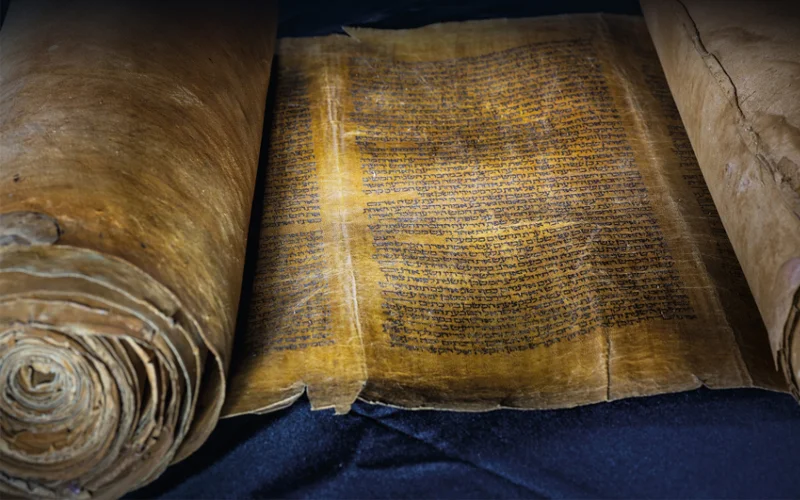 This ancient scroll of the Torah—the first five books in the Hebrew Bible—shows a fragment of the Book of Exodus, which recounts how God gave the Tablets of the Law to Moses, who had led the Israelites from Egypt into the Promised Land.