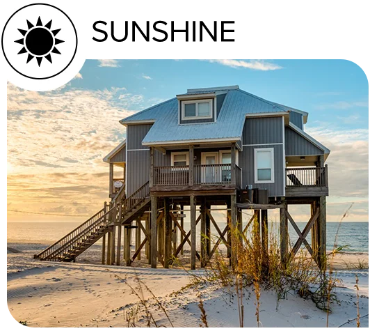 Relax in a private beachfront villa with sunlit views and direct access to sandy shores.